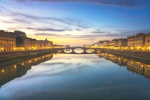 Carraia medieval Bridge on Arno river at sunset. Florence Italy