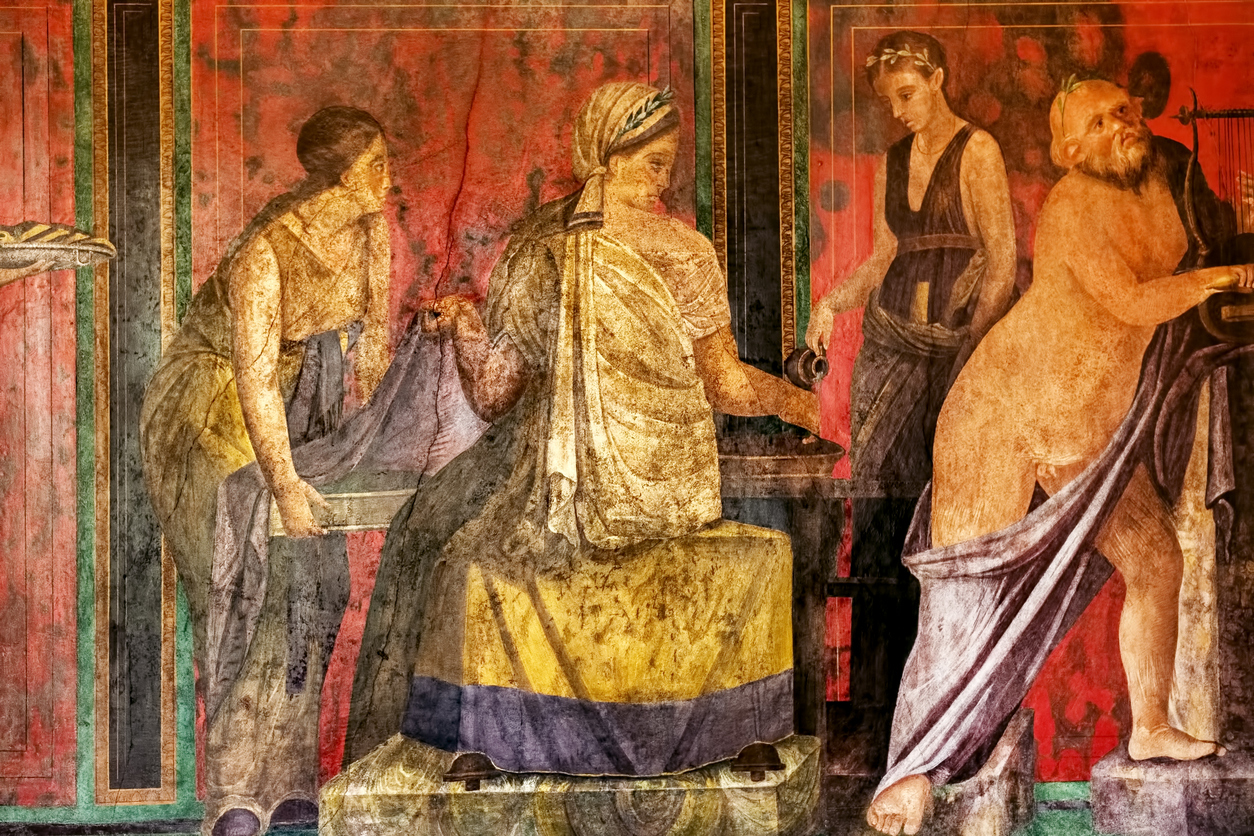 Ancient Roman fresco from the Villa of the Mysteries in Pompeii, showing figures in ceremonial dress